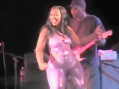 Large darksome booties in shiny spandex look sexy