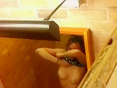 Constricted body playgirl tries on skimpy raiment