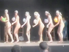 In Nature's Garb ladies dance on stage with balloons