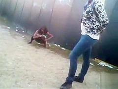 Lots of public pissing at a music festival