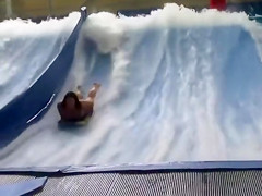 Bouncing large boobs at the water park