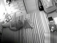 Bored housewife masturbates to agonorgasmos in the bedroom