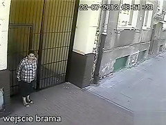 Elder lady taking a ooze on the street