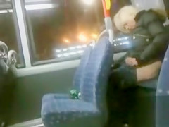 Drunk blond madam pissing in the back of the bus