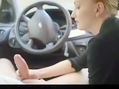 Moist cutie giving an outstanding tugjob in car