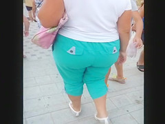 Voyeur likes filming older hotties's large arse