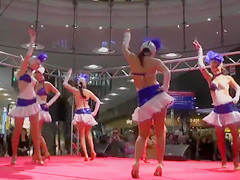 Hot cuties in short skirts dancing for the crowd