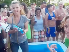 Bikini women wrestling for an audience