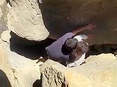 Drilling her snatch betwixt the rocks