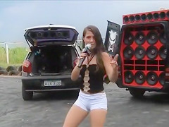 Legal Age Teenager Lalin Girl dancing and singing in a parking lot