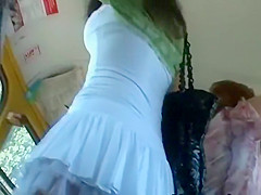 Peeping underneath a fluffy petticoat at a bus