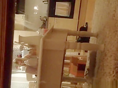 Woman spied in her kitchen