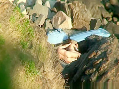 Nudist pair fucking in the rocks