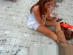 Tit slide on the street