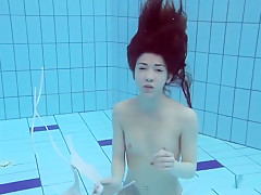 Roxalana Swims Like A Fish With Her Taut Muff