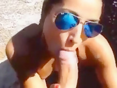 Hawt girlfriend blows on the beach