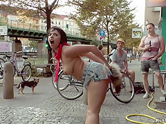 Breasty Euro sweetheart arse plugged in public