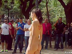 Stripped floozy shamed in public street