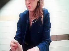 Legal Age Teenager pissing in public crapper