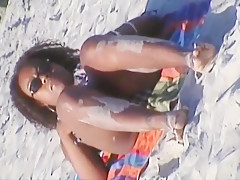 beach bikini wedgie picking