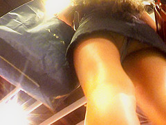 Upskirt of a dark jeans petticoat