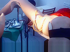 beauty in red on a gynecological chair