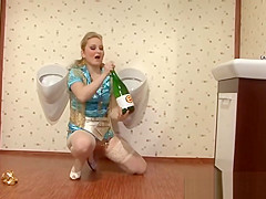 Party whore fucking a bottle with champain