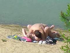Nudist fuck filmed by beach spy