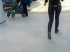 Lengthy hair redhead in constricted darksome sports panties