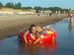 Spy naked beauty picked up by voyeur livecam at bare beach