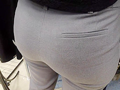 Charming soaked asses saleswoman in very constricted suit panties