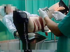 Nurse big O on a gynecological chair