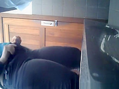 Overweight bald cookie peeing