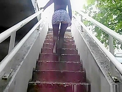 Exhibitionist in nylons and transparent blouse