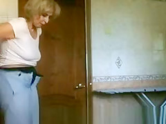 Mature woman caught peeing