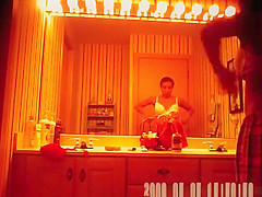 Woman spied changing in washroom