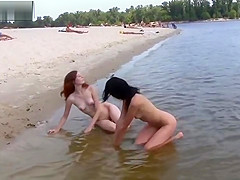 2 NUDIST BEACH NUBILES ON SAND AND IN SEA