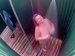 Plump hottie showers and shaves on hidden webcam