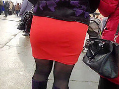 Wet asses golden-haired milfs in taut skirts